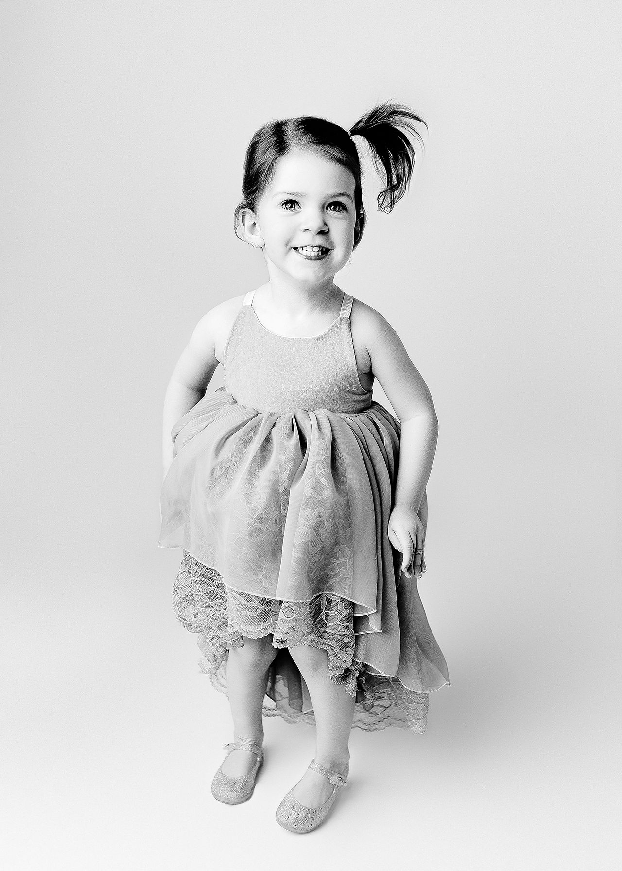 black and white pictures of kids by family photographer Kendra Paige Photography in Calgary, Alberta