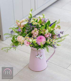 pink jug of flowers