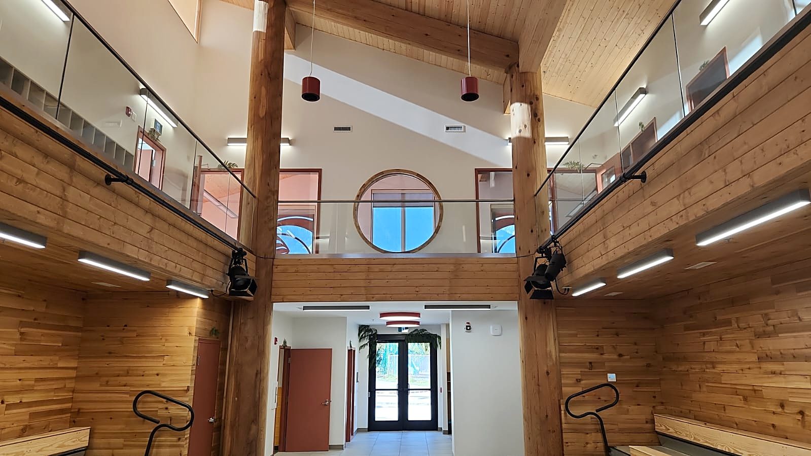 Two-storey atrium with wood finishes