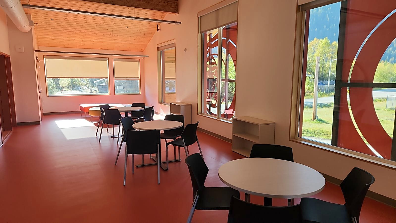 Bright eating area with mountain views