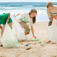 Children cleaning up the beach