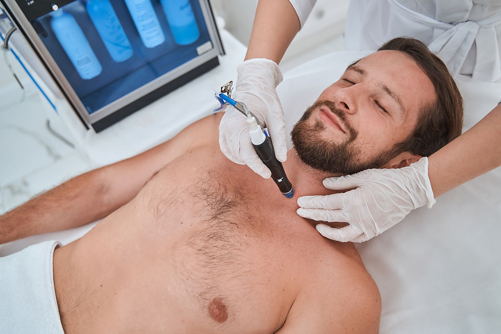 male-patient-getting-a-skin-treatment-in-a-beauty-2021-09-15-21-57-47-utc
