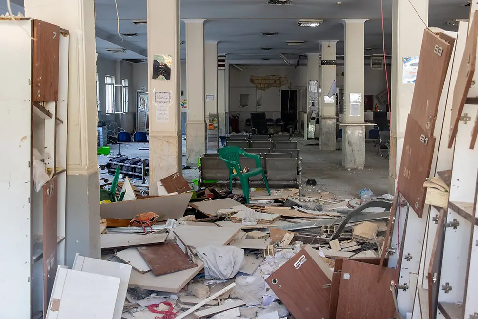 Collapsed wall pieces and other debris inside Evin prison’s visitor center, where families had been waiting to see their loved ones. Credit: Arash Khamooshi for The New York Times