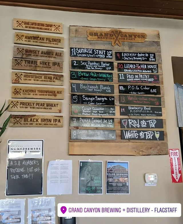 Large menu shown up on the wall.  At top of menu, states "Grand Canyon Brewing Co".