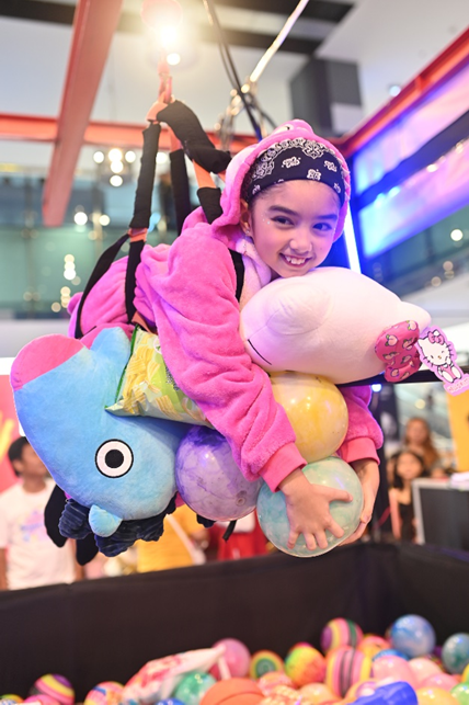 The human claw machine at the SuperKids Day.