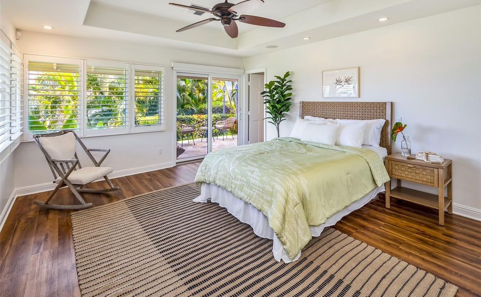 Ocean-inspired haven: Wood-accented home with open space, abundant light, and lush green surroundings.