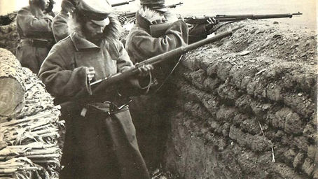 Book Cover showing soldiers with rifles in a sandbagged trench
