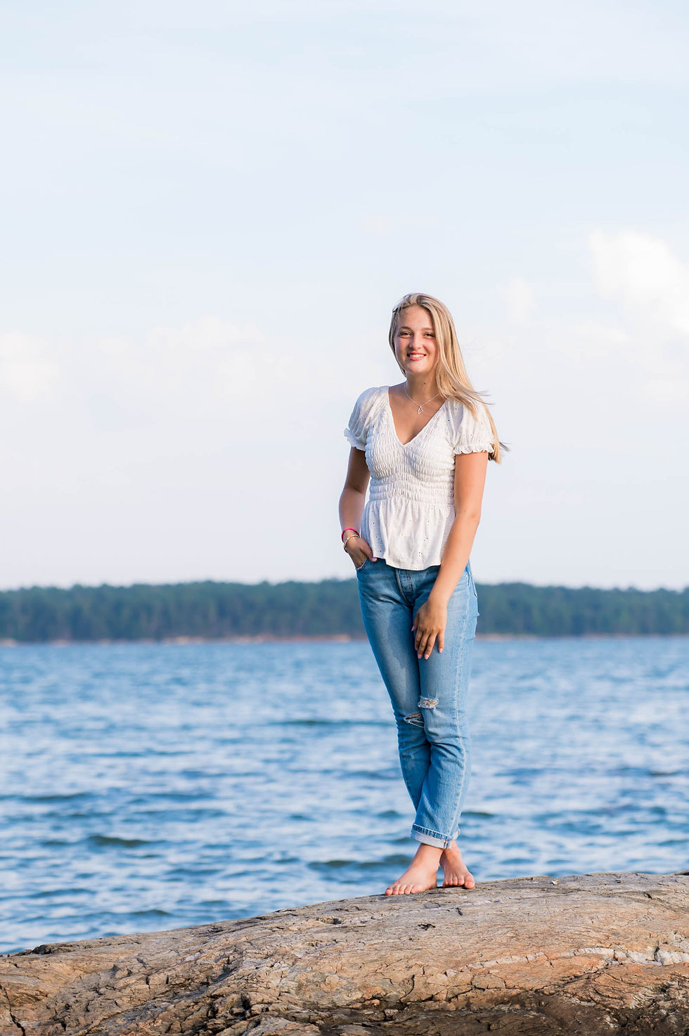 High School girl senior portraits on the water