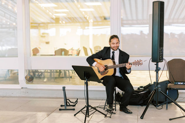 Acoustic guitarist R.D. King performing at a wedding