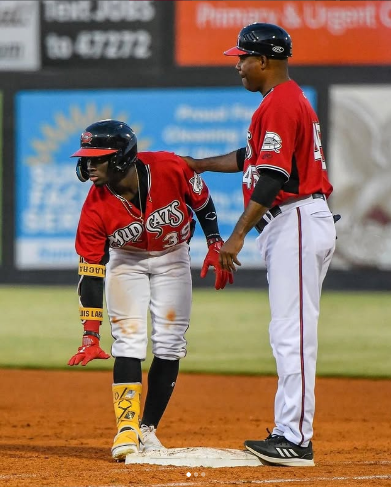 Milwaukee outfielder Luis Lara (left) and Staten Island hitting coach David Valdez as members of Milwaukee's Class A Carolina Mudcats in August 2023.