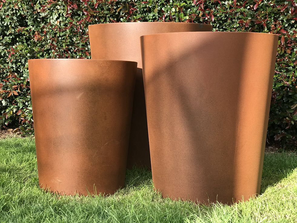 Thumbnail: CORTEN TAPERED CYLINDERS