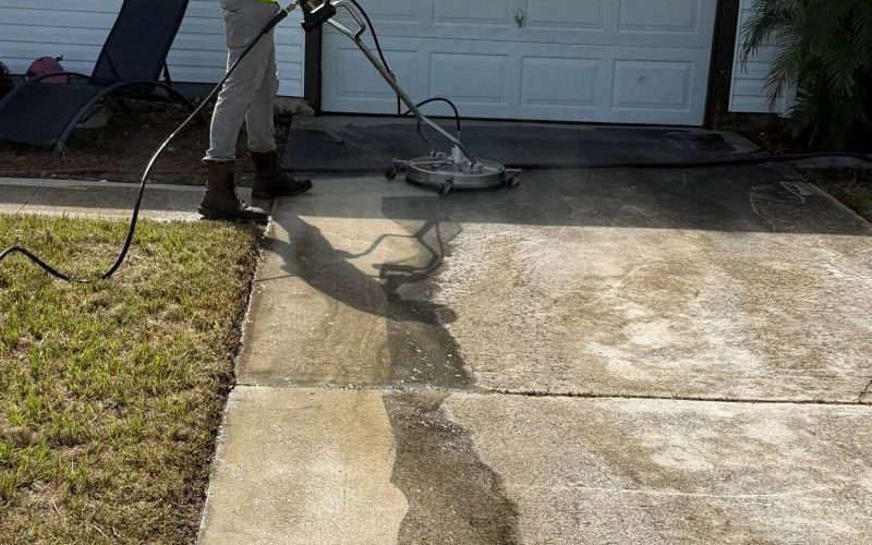 Dirty driveway before pressure washing in North Port, FL