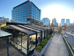 A Retractable Glass Rooftop Canopy and Fancy Weekend Brunch Debut in Fulton Market article by Eater Chicago