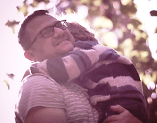 Dr Zee holding child