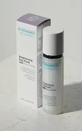 dr-schrammek-brightening-day-fluid-mela-white-bottle-and-box.webp