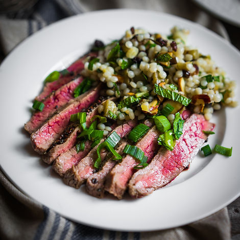 Samshotssliced-steak-with-couscous-and-vegetables-SBI-300754875.jpg