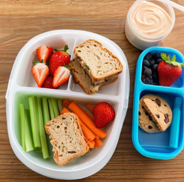 High angle view of a school lunchbox filled with gluten-free foods