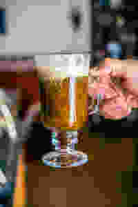 Irish coffee in a glass cup