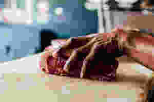 Man holding Brisket