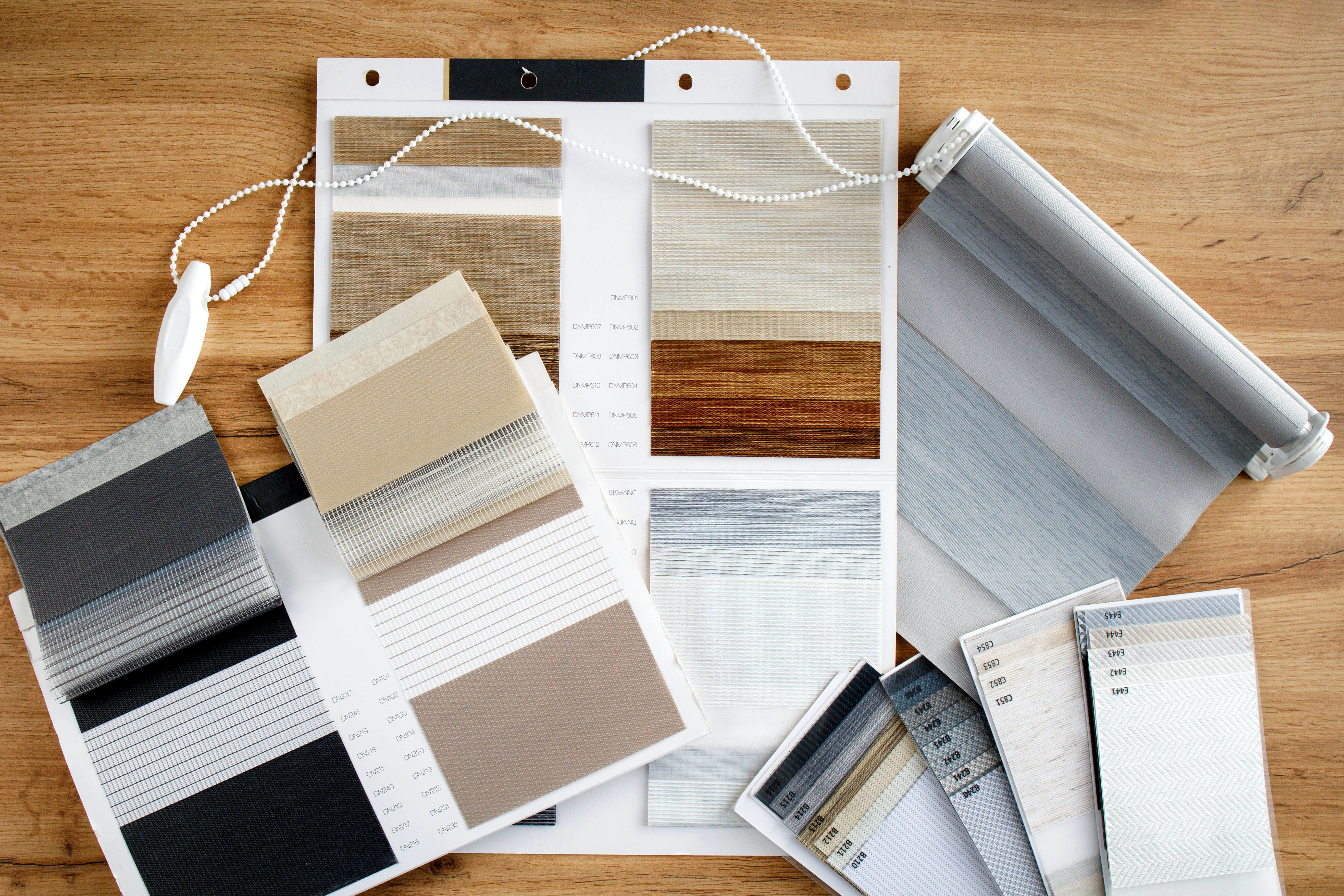 Variety of window blind samples on display for selection and design.