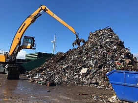 Grabber moving scrap metal at the Limerick Metal Company Ltd
