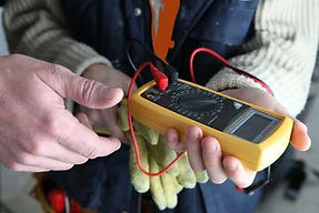 Electrician conducting a PAT test