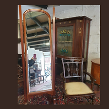 Mahogany Cheval Mirror made by O'Connell Lavits Quay, Cork. Sitting beside an Edwardian Bedroom Chair