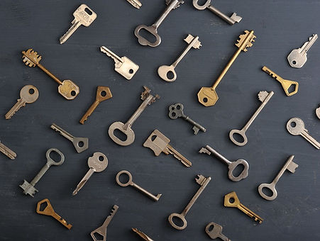 Collection of vintage keys on dark background