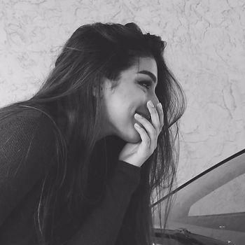Model veiling her smile. #Tumblr