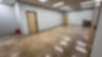 Commercial office polished concrete floor restoration by Surflex Systems.