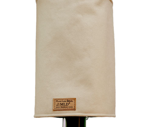 Picture of our handcrafted Loudspeaker Cover with leather touch in creme beige