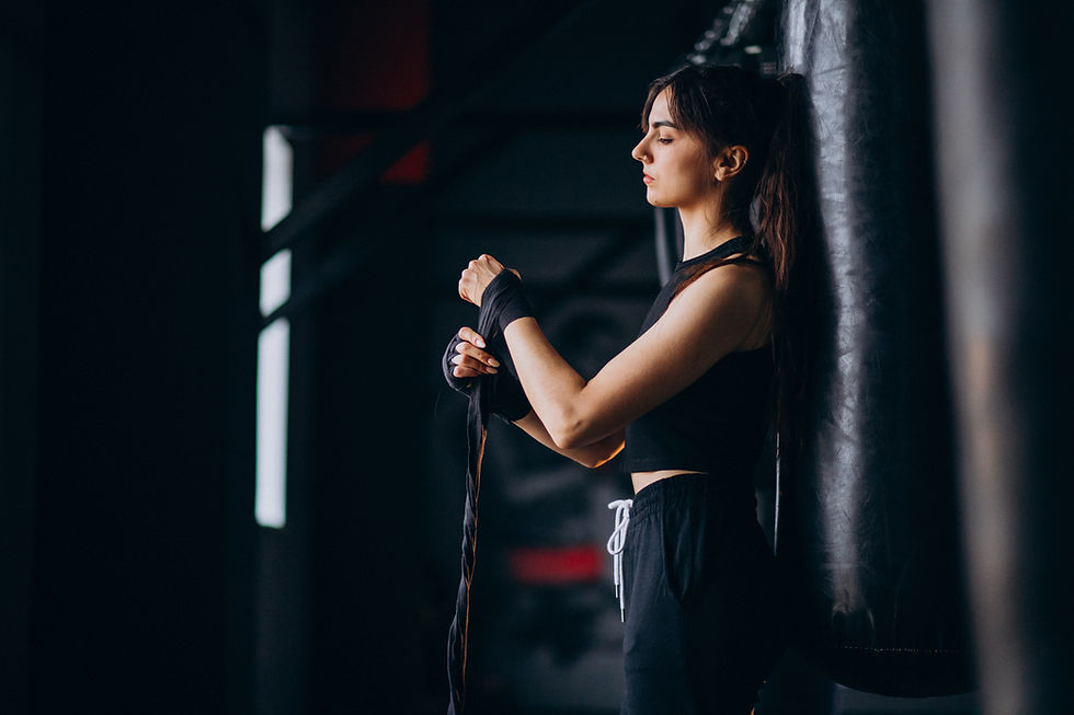 young-woman-boxer-training-gym.jpg