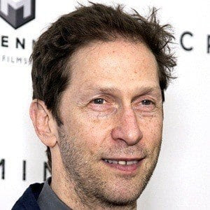 a picture of Tim Blake Nelson smiling