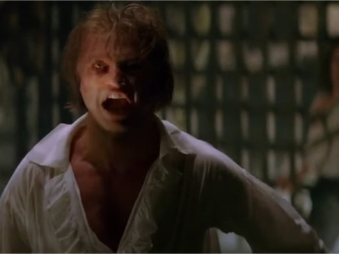 Erik with the left part of his face hidden by the shadow