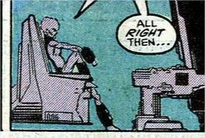 Sam sitting with a foot on his chair, his arm resting on this knee, the other foot on the ground