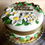 Thumbnail: Traditional Recipe Rich Fruit Cake Decorated with Marzipan and Fondant Icing