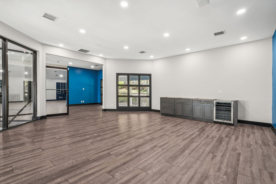 Bright and inviting living room at Avondale Village, featuring contemporary furniture and open layout.