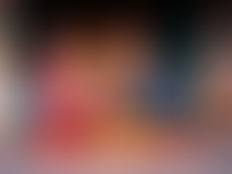 Two people in a cozy bar setting: one applying lipstick in a red robe, the other sipping a drink in blue pajamas. "Lobby Bar" sign visible.