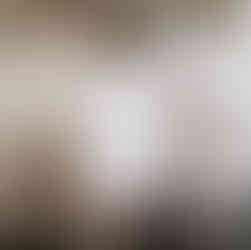 Shannon, owner of Made by Shannon, with her dog in her studio space