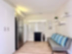 Flex room with futon, secondary refrigerator, Upright freezer, and storage closet