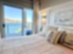 Master bedroom with lake front view