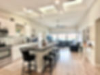 Kitchen Entry overlooking family room to water & lakefront view