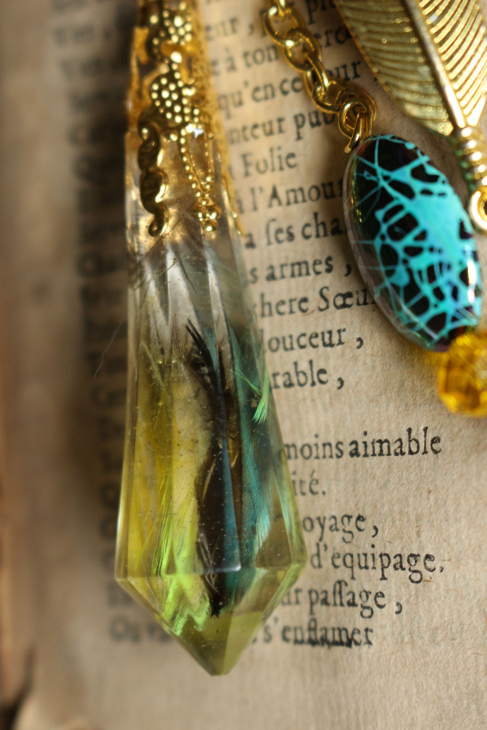 Miniature : Pendule de plumes 