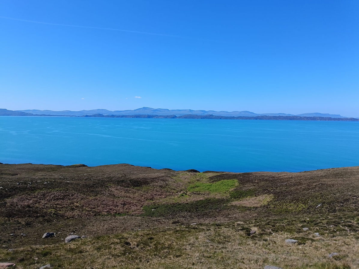 Rassay Rona and Skye from mainland.jpg