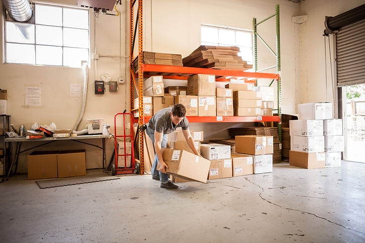 Warehouse Worker Lifting