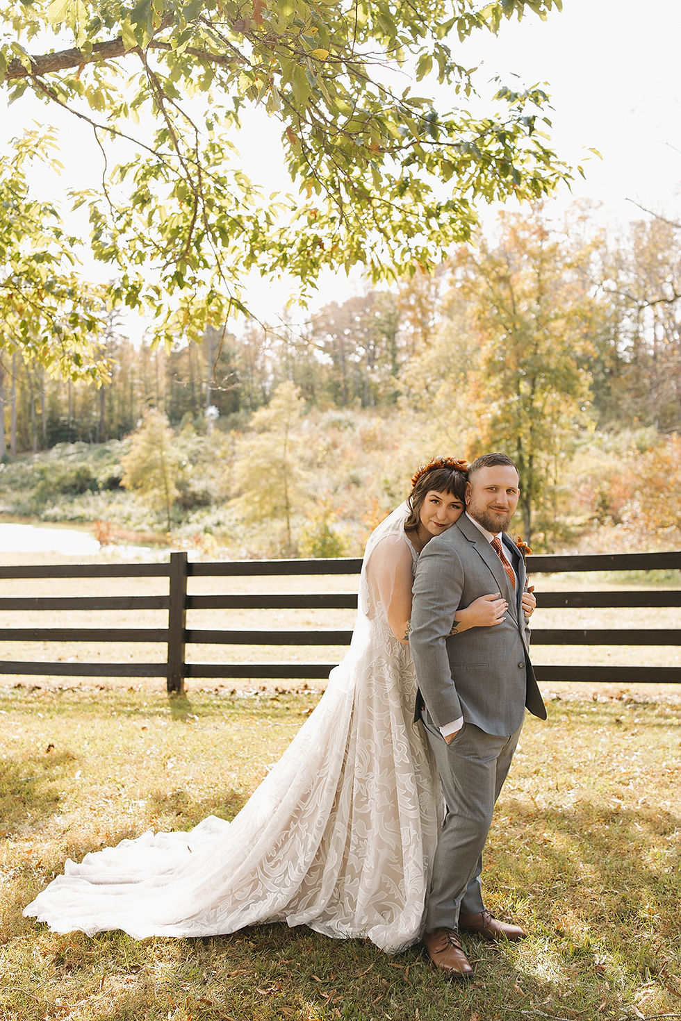 Eye-level view of a charming rustic barn wedding venue with wooden beams and string lights