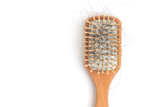 Hair brush with hair loss