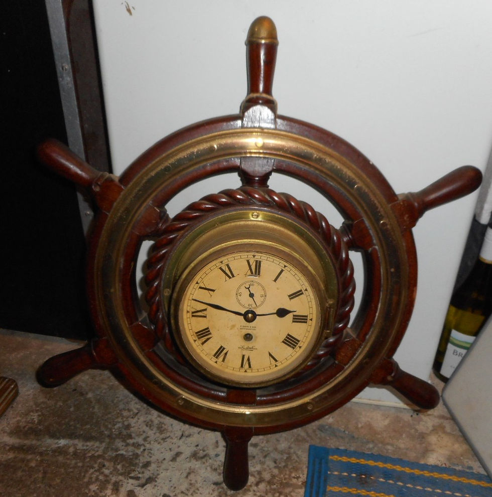 Sestrel clock on wheel. Plaque Mauretania 1.