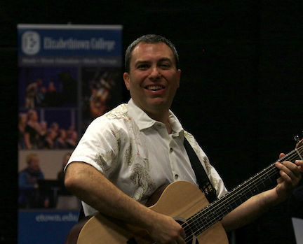Michael Checco Playing Guitar