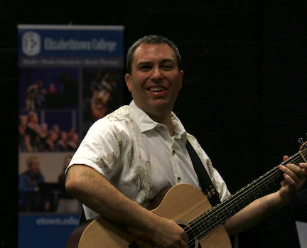 Michael Checco Playing Guitar
